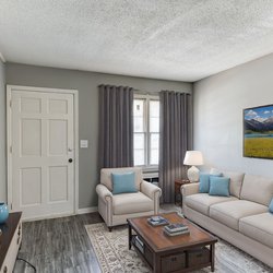 living room view at Ashley Oaks Apartments located in Perry, GA